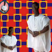 LAWRENCE SHOLA
